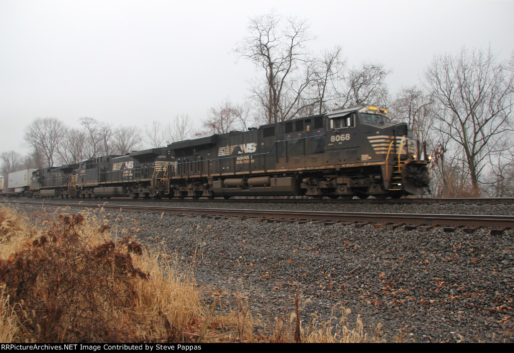NS 8068 with an eastbound freight at MP116